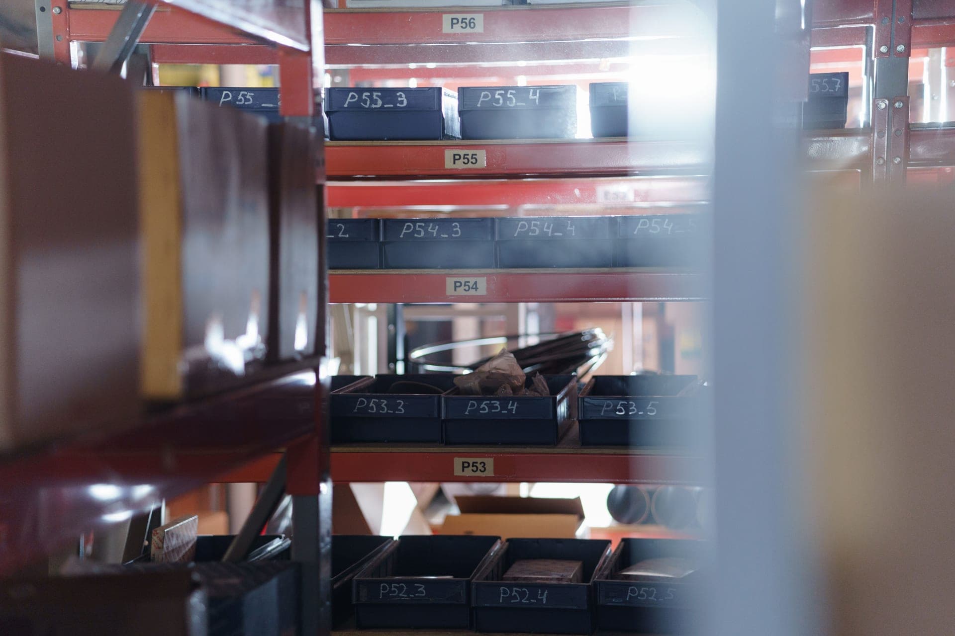 Labeled storage boxes on a shelf