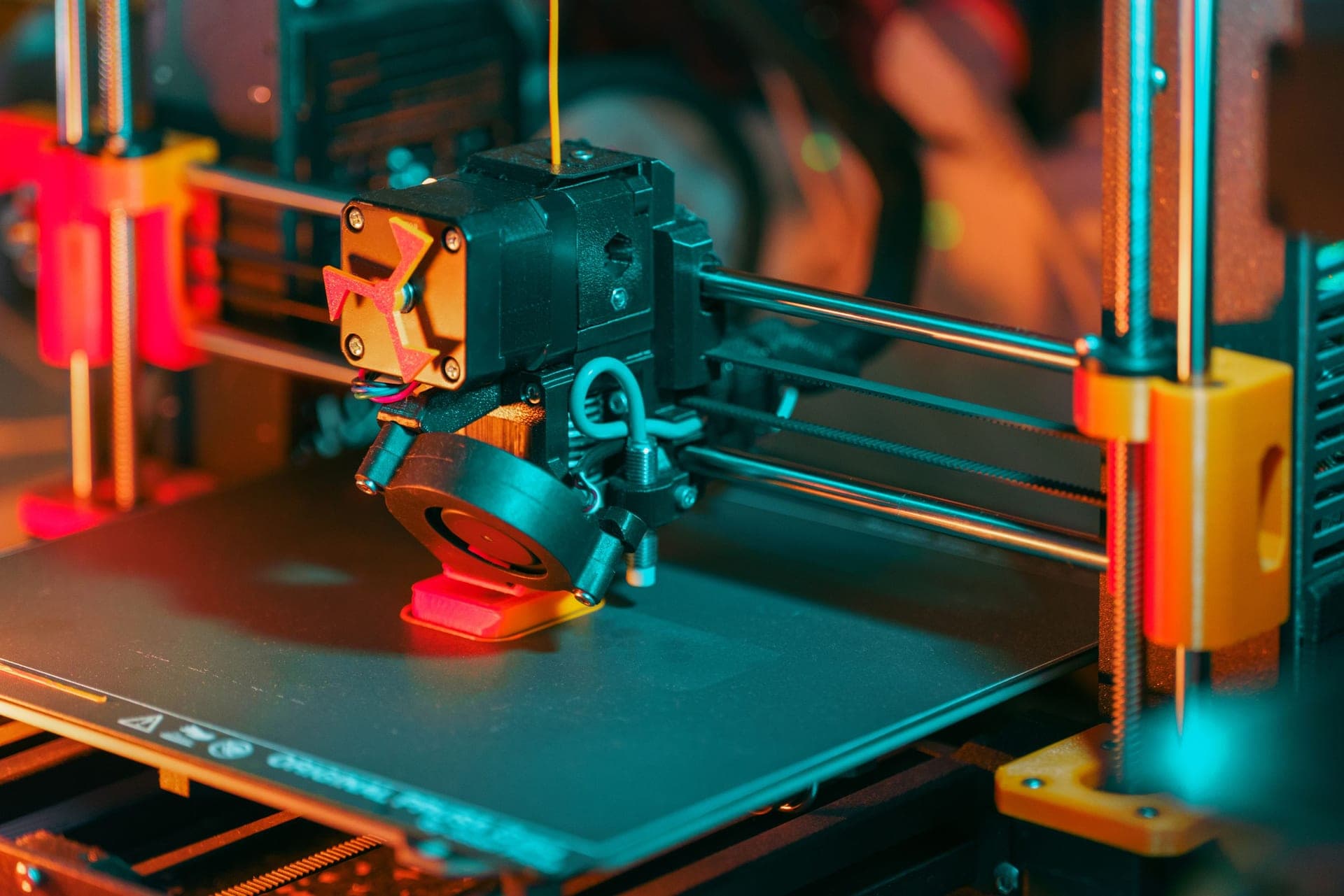 A resin printer with a model on the build plate